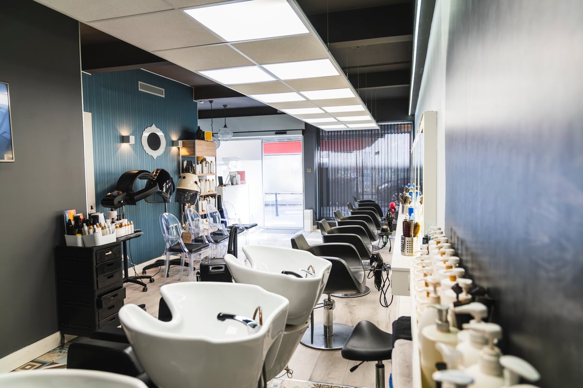 Modern hair salon interior with styling chairs