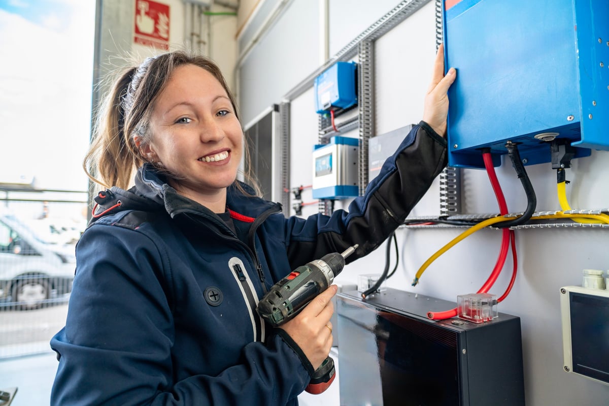 Professional tradesperson checking electrical equipment