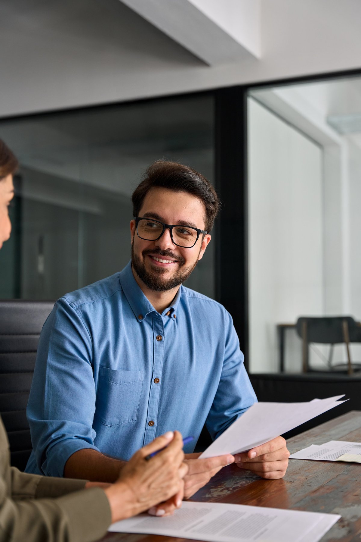 Business consultant meeting with client in modern office